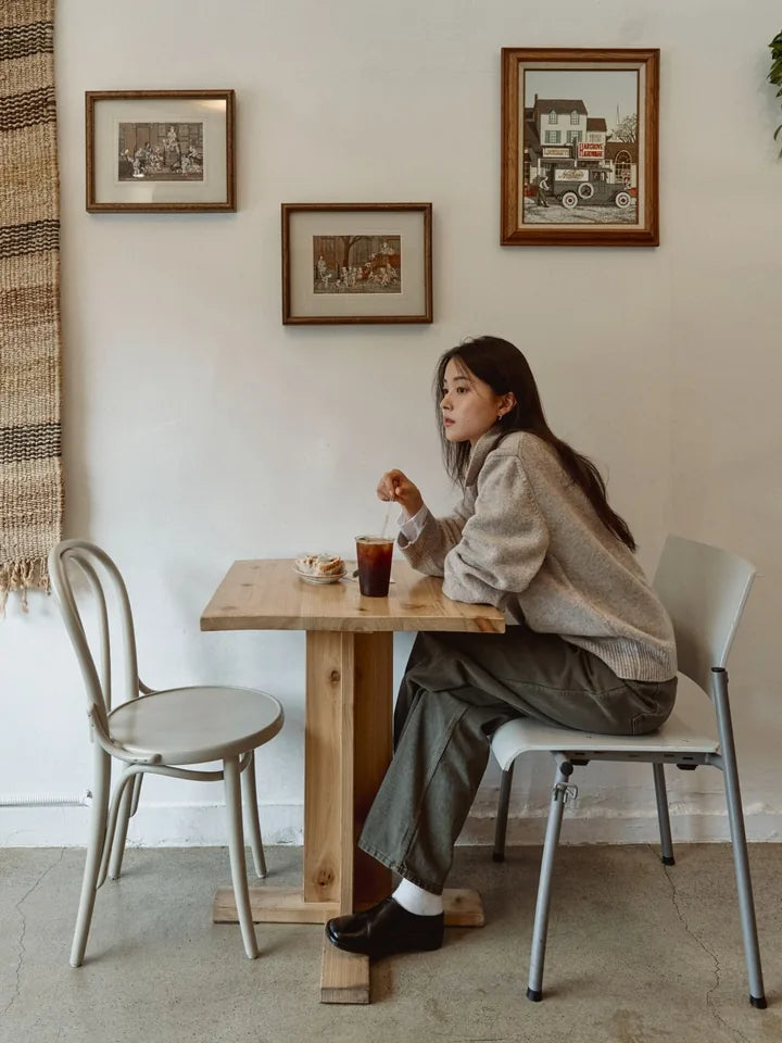 

A beige knit and white turtleneck for a lingering café afternoon — 1