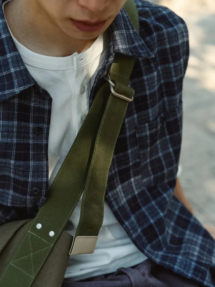 

A check shirt and purple denim between sun and shade — 3